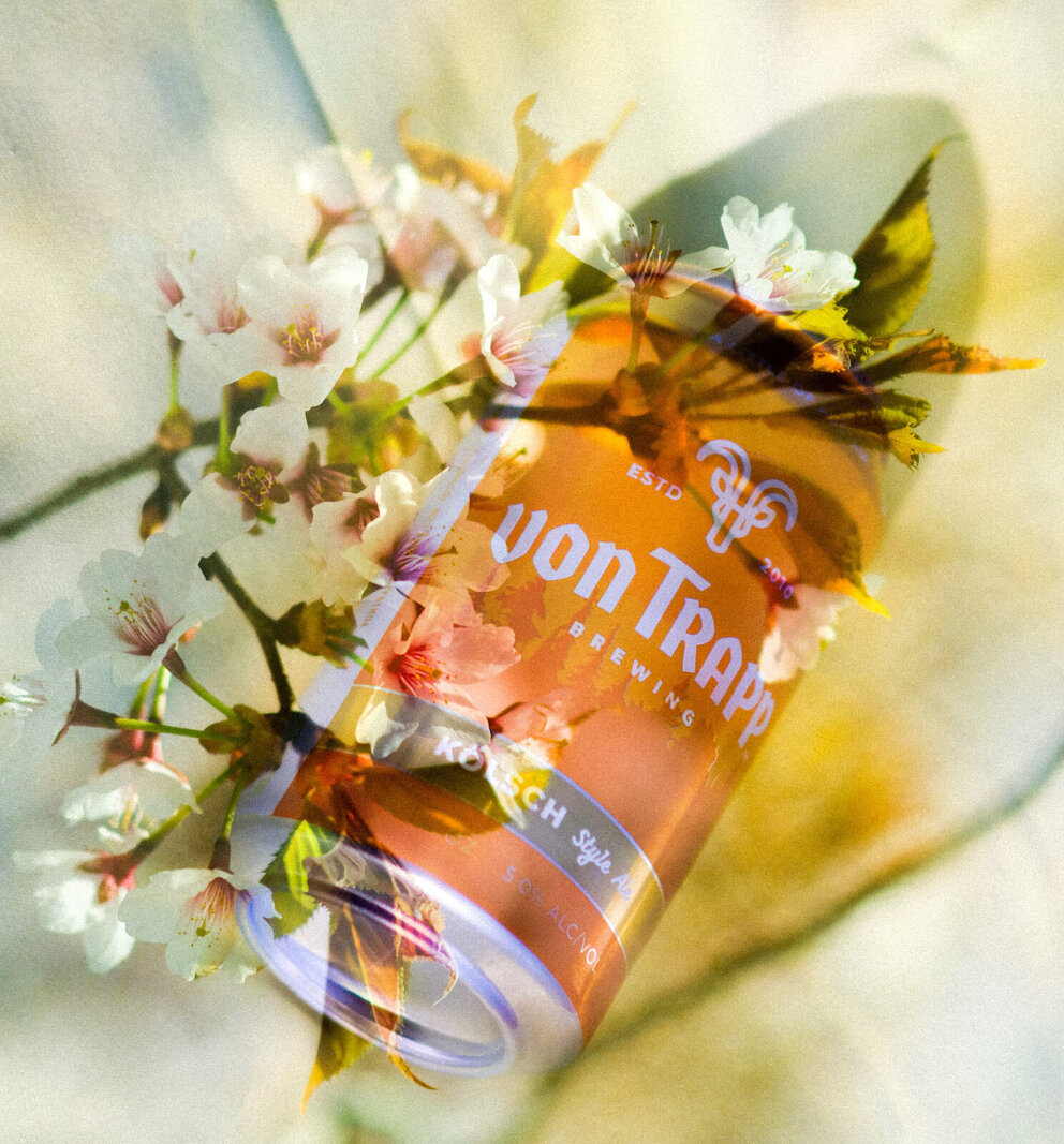 can of kolsch with flowers