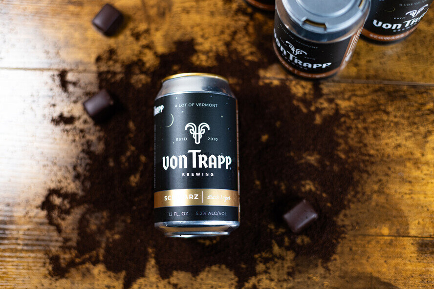 a can of beer on a table